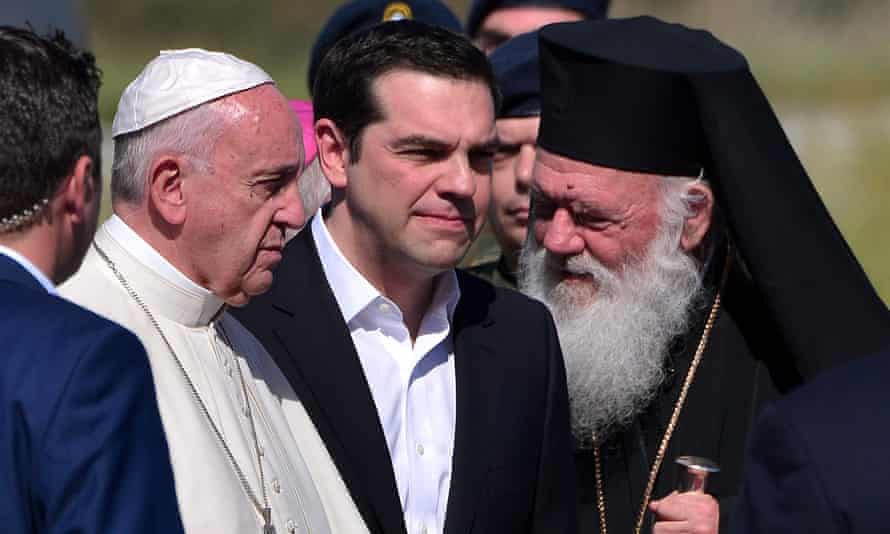Pope Francis is greeted by the Greek prime minister, Alexis Tsipras (centre) and Archbishop Ieronymos.