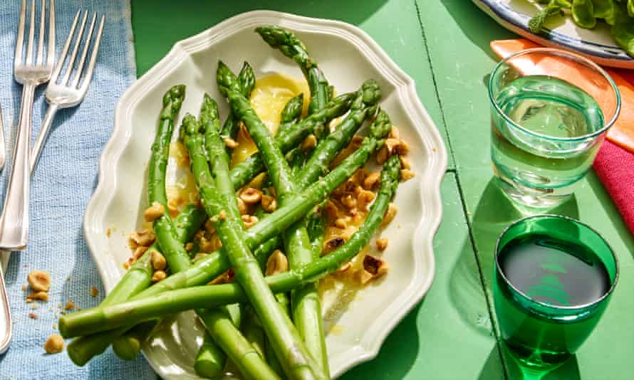 Rachel Roddy Asparagus with melted butter and toasted hazelnuts.