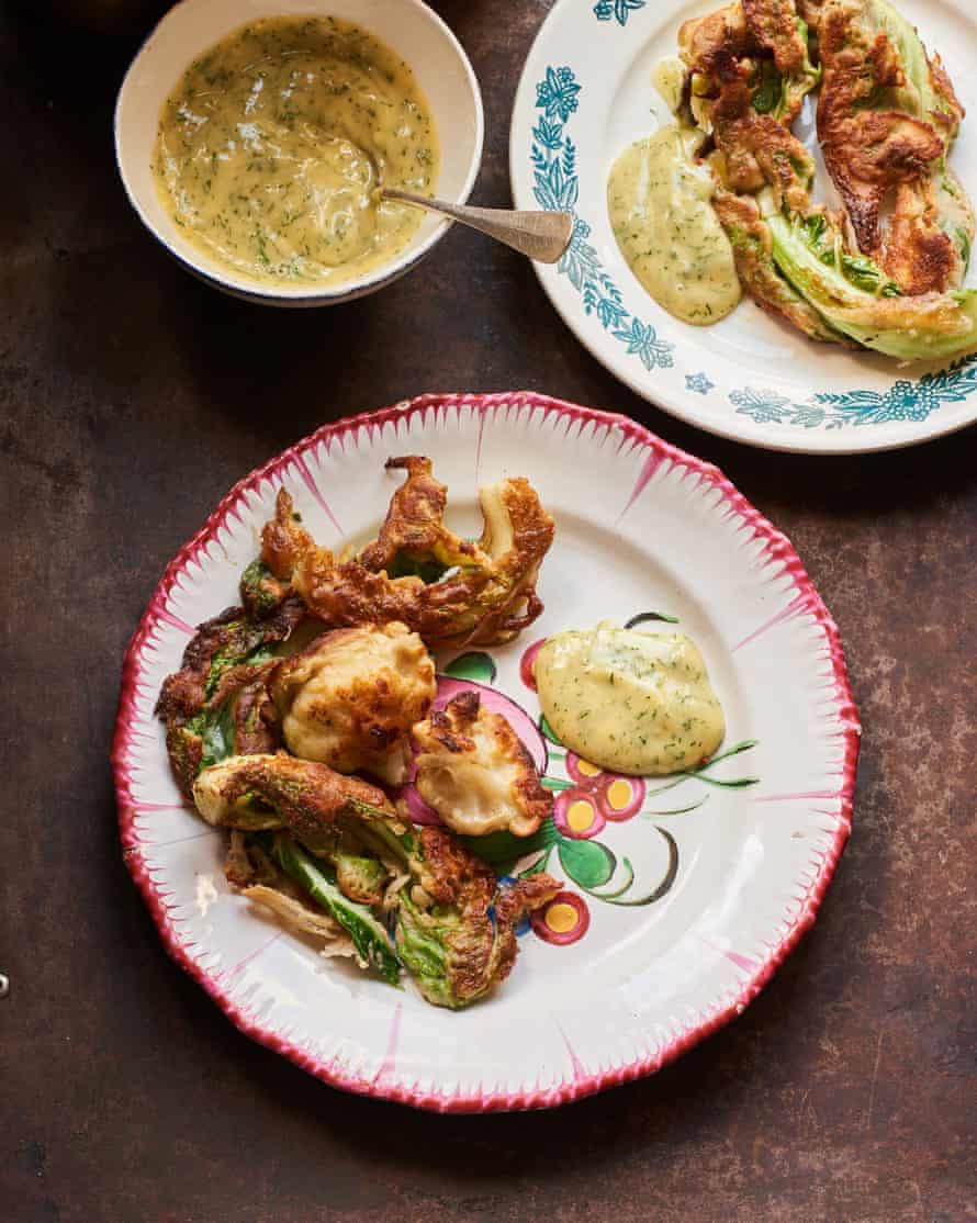 Colorful plates hold golden brown fried cauliflower.