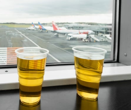 Pints of beer in the departure lounge bar in Newcastle airport.