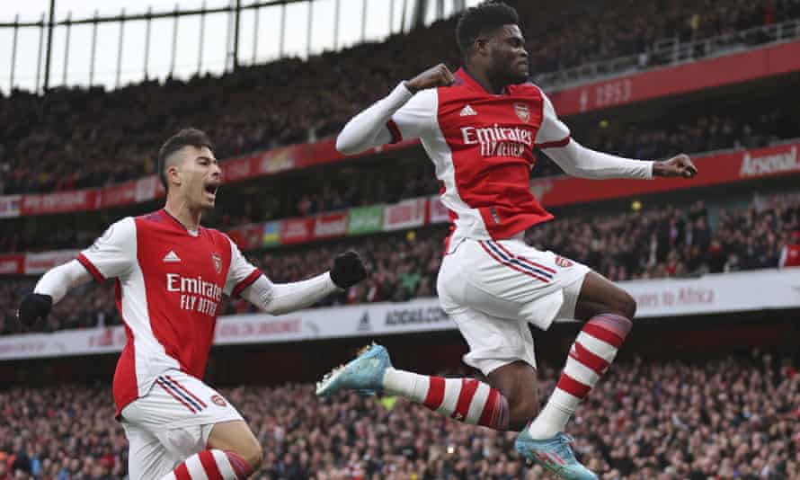 Arsenal’s Thomas Partey jumps for joy after scoring the first against Leicester