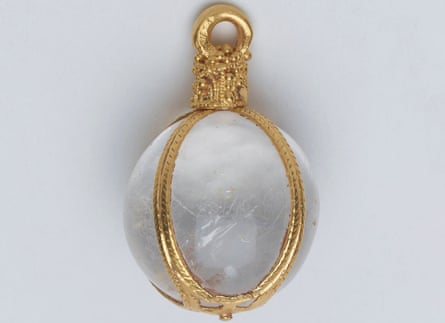 A rock crystal pendant chased in gold.