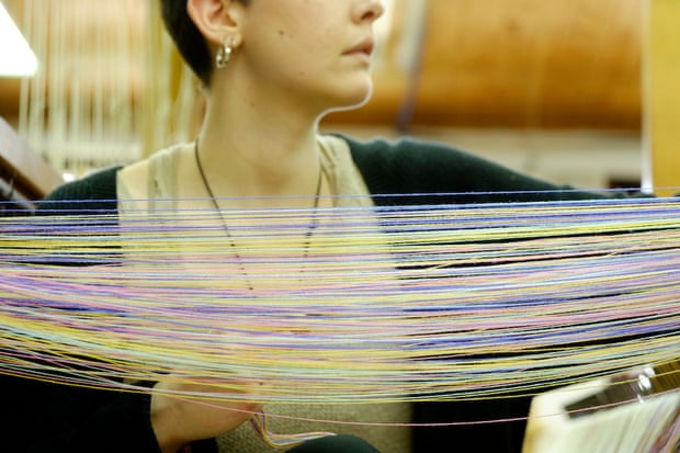 A worker at the San Patrignano Design Lab in Italy which trains recovering addicts in weaving and other crafts