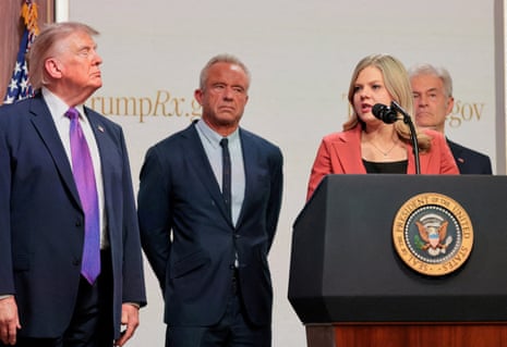 a woman speaks into a microphone