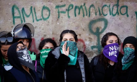 People participate in a protest against gender-based violence outside the National Palace in Mexico City, Mexico, 18 February 2020.