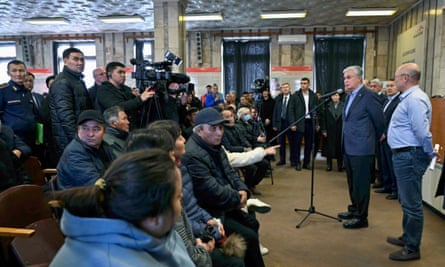 Kassym-Jomart Tokayev speaking to employees and relatives at the coalmine