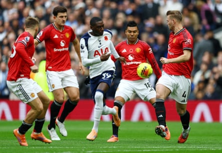 Tottenham Hotspur’s Randal Kolo Muani surrounded by Manchester United’s defence