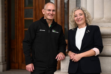 Paul Hopper (left) and Melissa Lowe in front of Victorian Parliament House