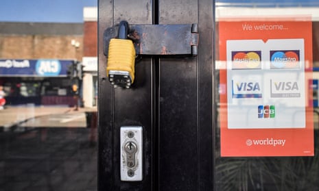 A padlock on a closed shop in Bristol during the Covid lockdown