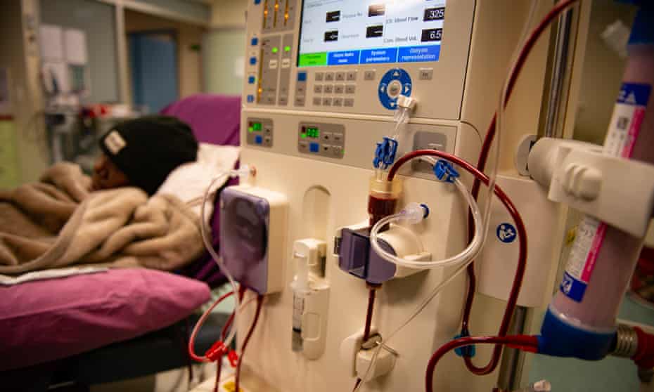 a patient and a dialysis machine