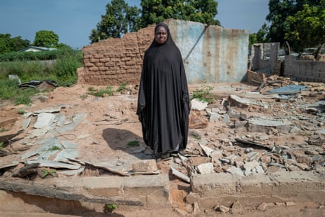 Binta Bah outside what remains of her home in Jalambang, the Gambia, after it was destroyed in a windstorm and flooding in July.