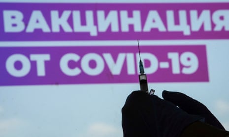 A healthcare worker prepares a one-dose Sputnik Light vaccine at a vaccination centre in Luzhniki Stadium in Moscow, Russia.
