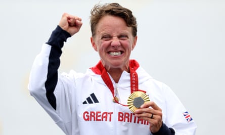 Emma Wiggs celebrates with her gold medal