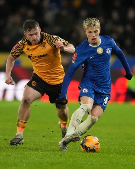 Alejandro Garnacho competes with Regan Slater for the ball during the FA Cup fourth round match between Hull and Chelsea