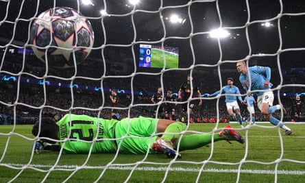 Erling Haaland fires his first goal home from the penalty spot.