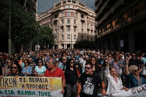Hundreds of people fill the street during a protest
