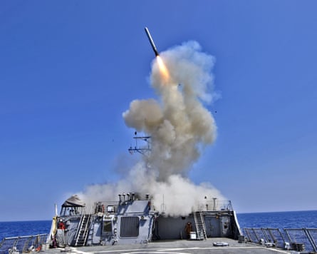Tomahawk cruise missile is launched from a US navy destroyer.