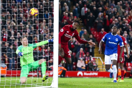 December 2: Divock Origi of Liverpool scores a late goal to defeat Everton.