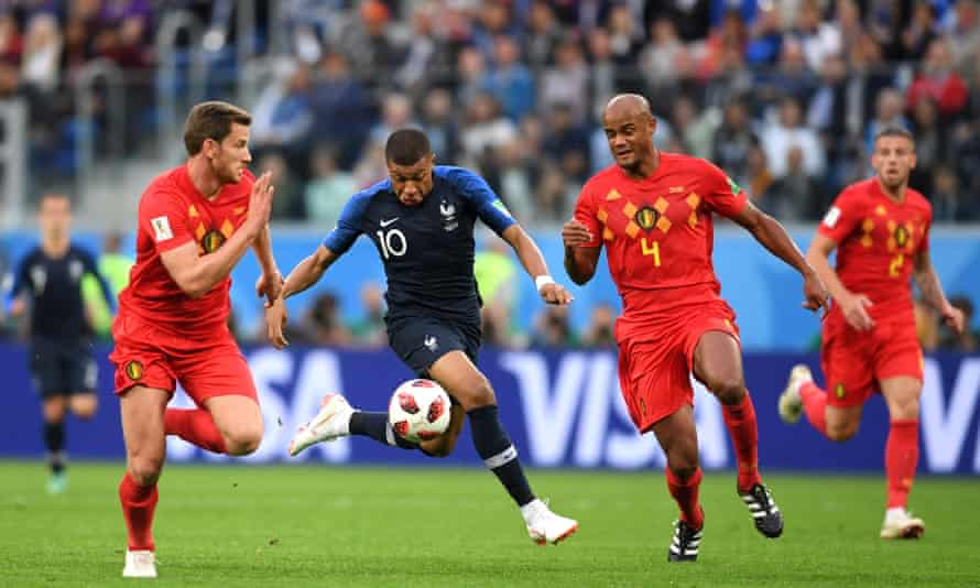 Kylian Mbappé (centre) is shadowed by Jan Vertonghen (left) and Vincent Kompany as France beat Belgium in the 2018 World Cup semi-final.