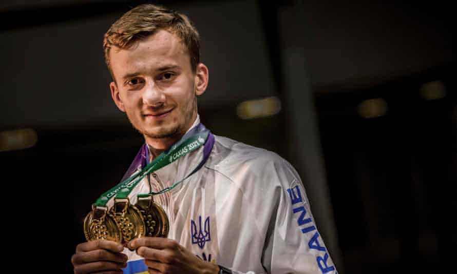Ukranian orienteerer Dmytro Levin with his medals at the 24th Summer Deaflympics, in Caxias do Sul, Brazil.