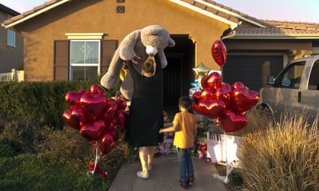Neighbors drop off gifts for the Turpin children in Perris, California, on Thursday.