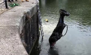 The toppled statue of Edward Colston is recovered from the harbour in Bristol on 11 June