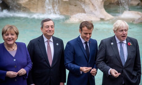 Angela Merkel, Mario Draghi, Emmanuel Macron and Boris Johnson during a photo opportunity of the leaders of the G20 summit at Trevi Fountain, Rome