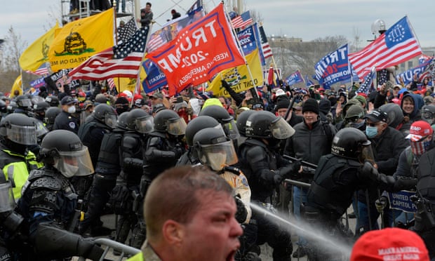 Trump supporters clash with police and security forces on 6 January at the US Capitol. Trump was banned from Facebook the next day.
