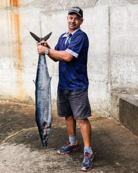 Keith Yon with a freshly caught fish.
