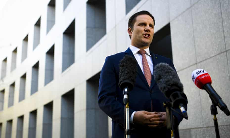 Sign here': Alex Hawke, the former US marine and the photo at the centre of their court battle | Law (Australia) | The Guardian