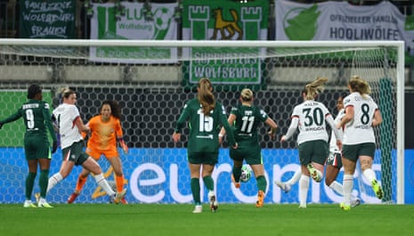 Wolfsburg's Alexandra Popp smacks the ball home to give the home side the lead.