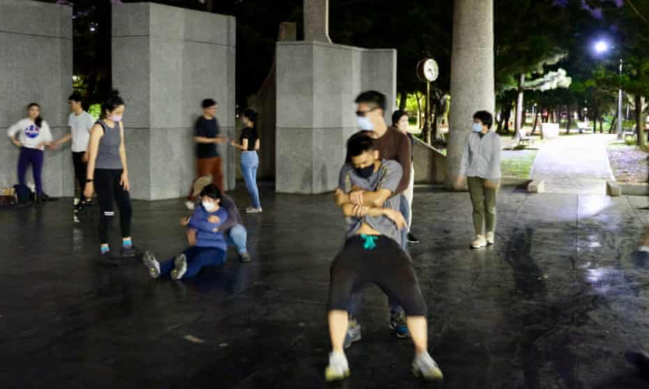 A grassroots community group train themselves in first aid and combat fitness drills at Da’an Park in Taipei. People in Taiwan have grown increasingly keen for civilian defence training in the wake of Russia's invasion of Ukraine.