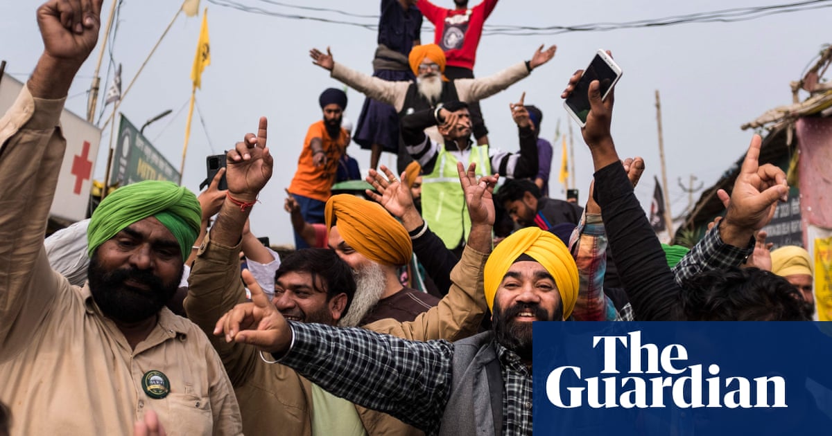 Modi repeals controversial laws in surprise victory for Indian farmers – video report