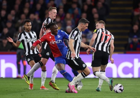 Newcastle United’s Fabian Schar and Sean Longstaff attempt to deal with Crystal Palace’s Eberechi Eze as he attempts to go past them.