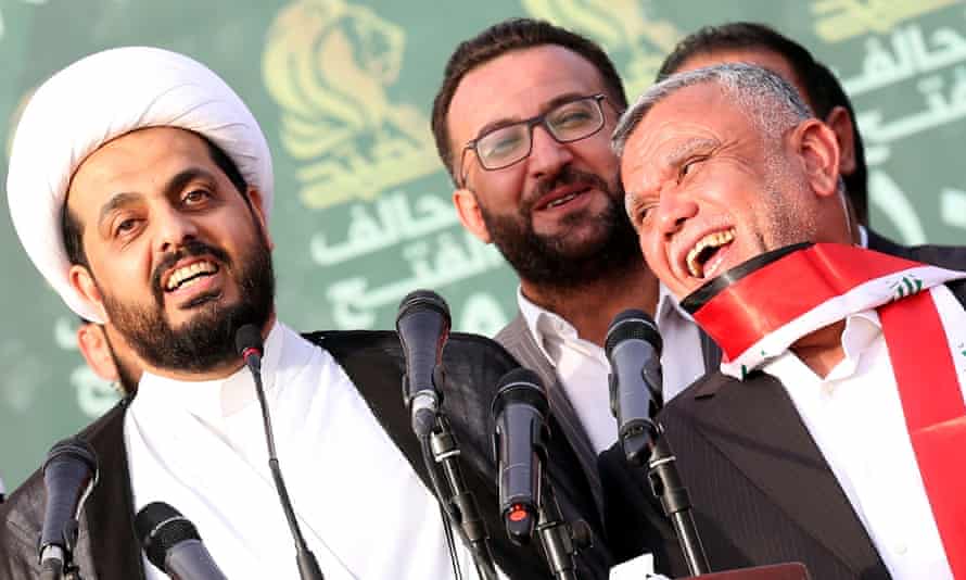 The PMF’s Sheikh Qais al-Khazali, left, and Hadi al-Ameri, right.