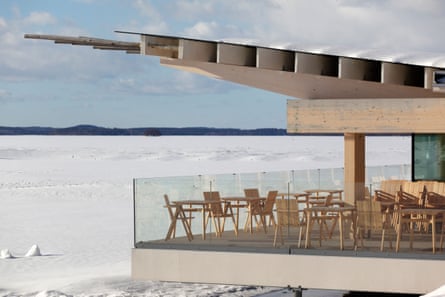 Modern cafe by frozen lake