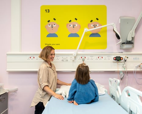 Taking heart: Mina Holland with her daughter on Snow Fox ward at Evelina London Children’s Hospital.