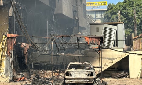 Smoke rises from damaged buildings in the aftermath of Israeli airstrikes on Beirut.