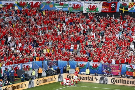 Wales fans rise to celebrate Hal Robson-Kanu’s late winner against Slovakia at Euro 2016
