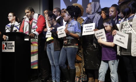 The Rev William Barber and the Rev Liz Theoharis, co-chairs of the Poor People’s Campaign, speak at the National Civil Rights museum on 3 April.