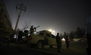 Afghan security officials near the Intercontinental hotel in Kabul on Saturday.