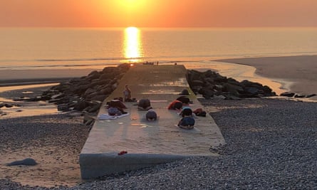 Sunset beach yoga
