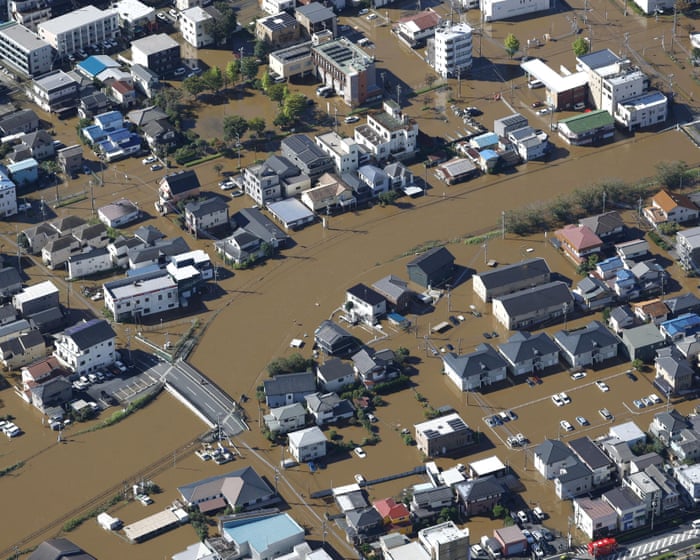 At least two people killed in Japan as typhoon Dujuan triggers heavy rain, landslides