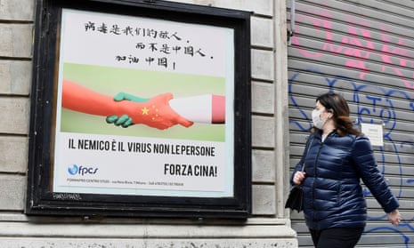 A poster in Milan reads: ‘The virus is the enemy not the Chinese people’