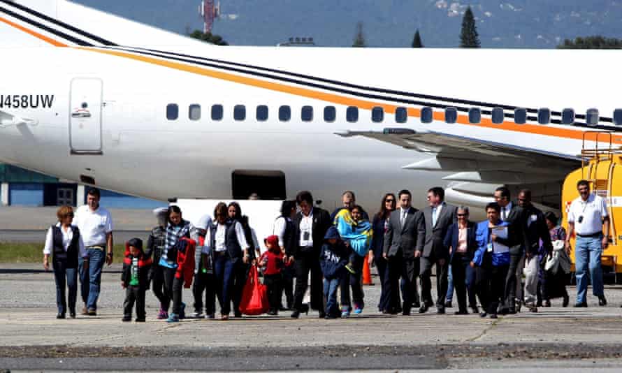 Fourteen people, four mothers and ten children, deported from US to Guatemala arrive at the International Airport of La Auroa earlier this month.