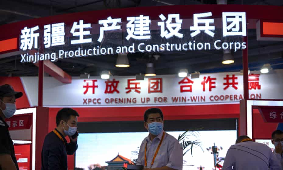 A stand for XPCC, a state-run authority that operates in Xinjiang, at a trade fair in Beijing.  