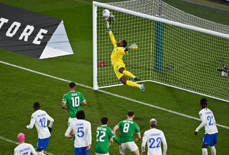 France’s goalkeeper Mike Maignan makes a save late in the game.