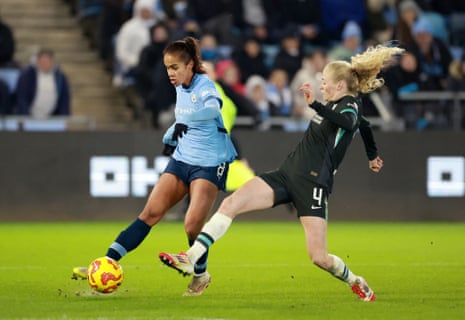 Manchester City's Mary Fowler in action with Liverpool's Grace Fisk
