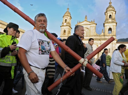 Gustavo Moncayo walks in chains through Plaza de Bolívar in Bogotá to call for the release of his son, September 2009.