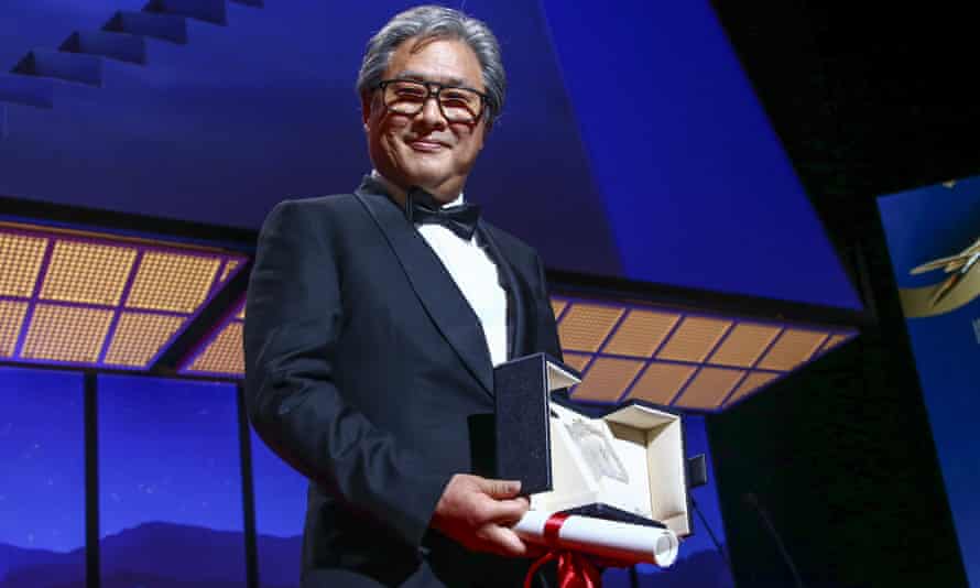 Director Park Chan-wook accepts the award for best director for Decision to Leave.